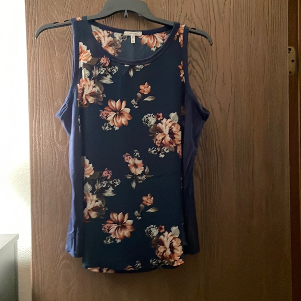 Gently used size XL navy floral top.